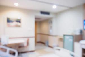 interno della stanza d'ospedale con sfocatura astratta con letto medico per lo sfondo foto