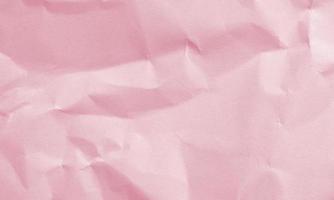 sfondo di struttura di carta stropicciata color rosa intenso per il design, decorativo. foto