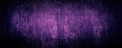 fondo di struttura del muro di cemento astratto viola scuro foto