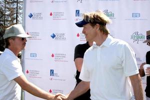 los angeles, 14 aprile - david spade, jack wagner al torneo di golf annuale jack wagner a beneficio di lls al campo da golf in riva al lago il 14 aprile 2014 a burbank, ca foto