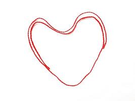filato per maglieria a forma di cuore isolato su sfondo bianco foto