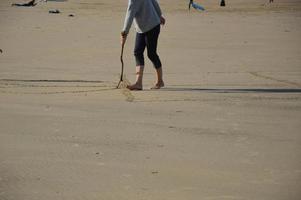 disegnare su una spiaggia foto