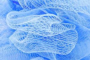 struttura in rete di plastica blu, sfondo astratto foto
