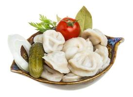 ciotola con piatto tradizionale russo - pelmeni foto