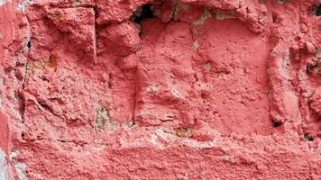 fondo astratto rosso di struttura della parete composta. struttura ruvida di cemento rosso foto