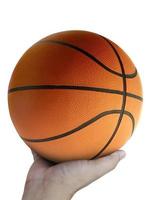 giocatore di basket in possesso di una palla su sfondo bianco foto