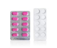 pacchetto di pillole rosa. concetto di farmacia e medicina foto