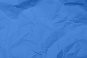 sfondo di struttura di carta stropicciata blu. sfondo di struttura di carta rugosa blu. sfondo di struttura del tessuto piega blu. sfondo blu tessuto rugoso.