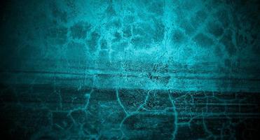 cemento blu spaventoso per lo sfondo. concetto di sfondo di halloween muro blu scuro. trama di cemento horror foto