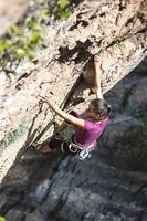 ragazza scalatore di roccia foto