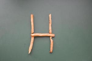 lettere dell'alfabeto inglese disposte da patatine fritte foto