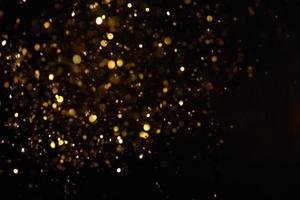 golden glitter bokeh illuminazione texture sfocato sfondo astratto per compleanno, anniversario, matrimonio, capodanno o natale foto