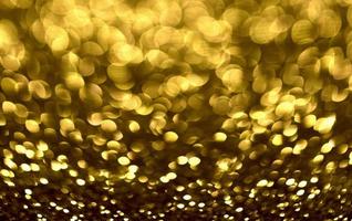 golden glitter bokeh illuminazione texture sfocato sfondo astratto per compleanno, anniversario, matrimonio, capodanno o natale foto