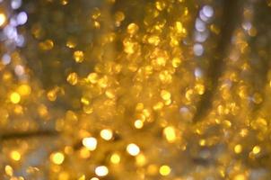 golden glitter bokeh illuminazione texture sfocato sfondo astratto per compleanno, anniversario, matrimonio, capodanno o natale foto