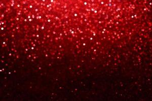 luci bokeh glitter rosso sfocato sfondo astratto per San Valentino, compleanno, anniversario, matrimonio, capodanno e natale foto