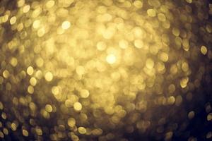 golden glitter bokeh illuminazione texture sfocato sfondo astratto per compleanno, anniversario, matrimonio, capodanno o natale foto