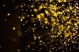 golden glitter bokeh illuminazione texture sfocato sfondo astratto per compleanno, anniversario, matrimonio, capodanno o natale foto