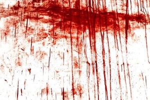 sfondo rosso, spaventoso muro sanguinante. muro bianco con schizzi di sangue per lo sfondo di halloween. foto