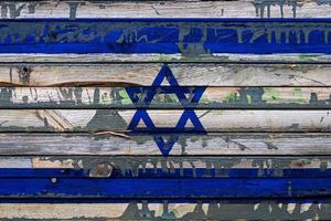la bandiera nazionale di Israele è dipinta su assi irregolari. simbolo del paese. foto