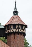 primo piano di una delle torri del castello di Malbork. Polonia foto