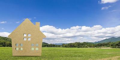 modello di casa con sfondo paesaggio posteriore foto