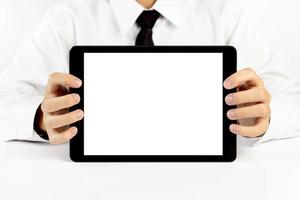 uomo d'affari in possesso di un tablet su sfondo bianco foto