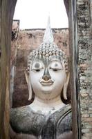 antica faccia di buddha, sukhothai, thailandia foto