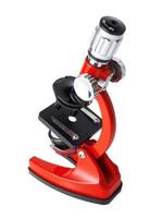 microscopio rosso isolato su sfondo bianco foto