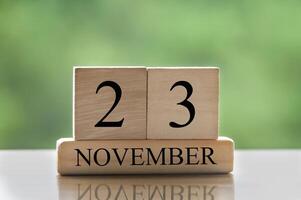 23 novembre testo della data del calendario su blocchi di legno con spazio di copia per idee o testo. copia spazio foto