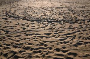 tracce sulla sabbia