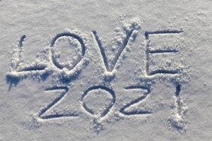 le parole amore 2021 disegnate sulla neve foto