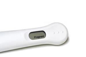 test di gravidanza positivo isolato su bianco foto
