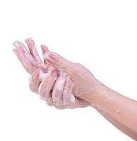 lavarsi le mani isolati su sfondo bianco. giovane donna asiatica che usa sapone liquido per lavarsi le mani, concetto di protezione del coronavirus pandemico, primo piano. foto
