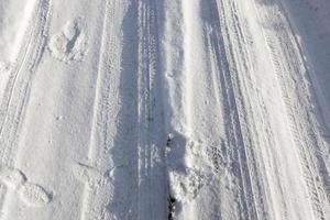 strada fangosa, inverno foto