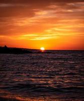 carta da parati tramonto sul mare foto
