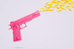 pistola rosa spara fiori di girasole su uno sfondo grigio chiaro. pistola rosa. concetto di pace. no guerra. foto
