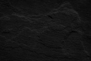 trama di sfondo nero pietra. vuoto per il design foto