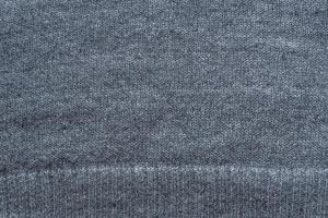 sfondo in tessuto grigio lavorato a maglia foto