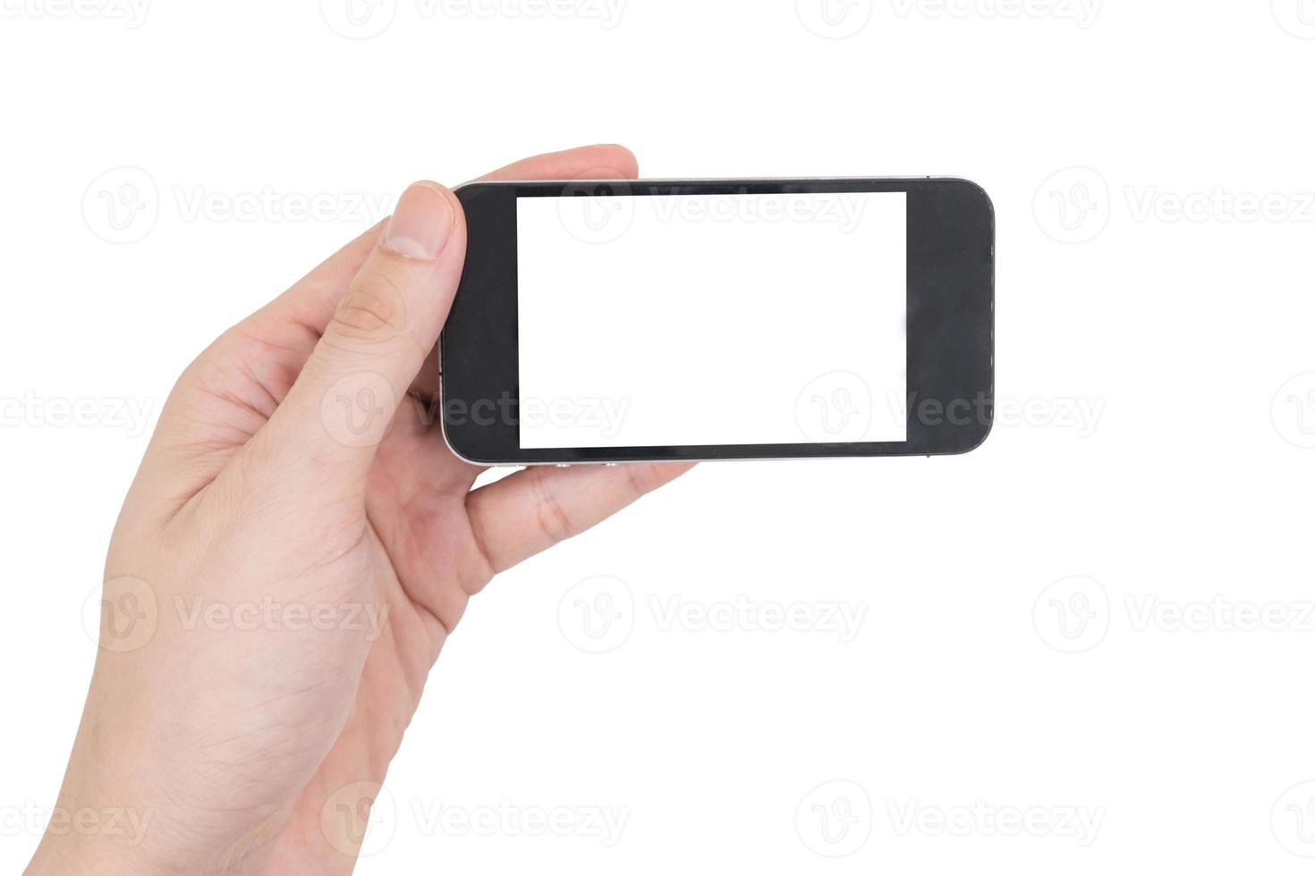 mão masculina segurando um telefone celular com tela branca em branco de toque sobre fundo branco. foto