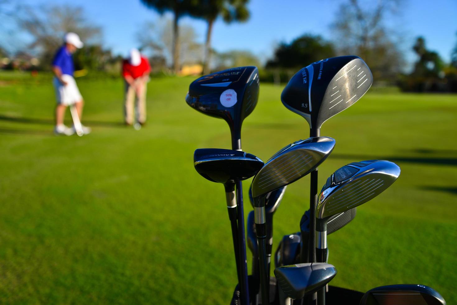 clubes de golfe e jogadores de golfe, foto