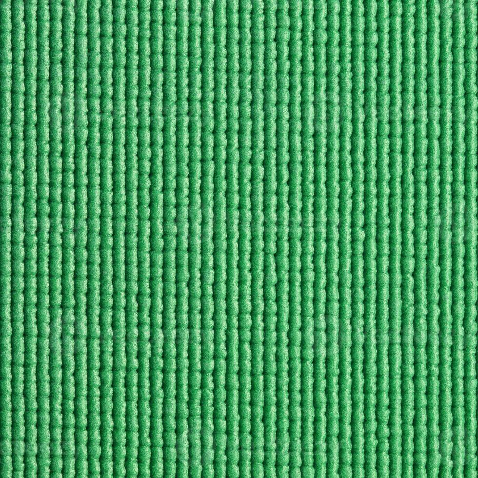 fundo de textura de tapete de ioga verde foto