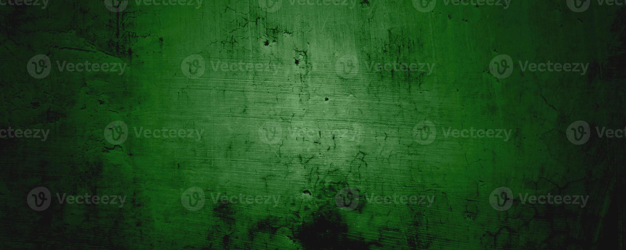 fundo de textura de parede verde. fundo de halloween assustador. fundo verde e preto grunge com arranhões foto