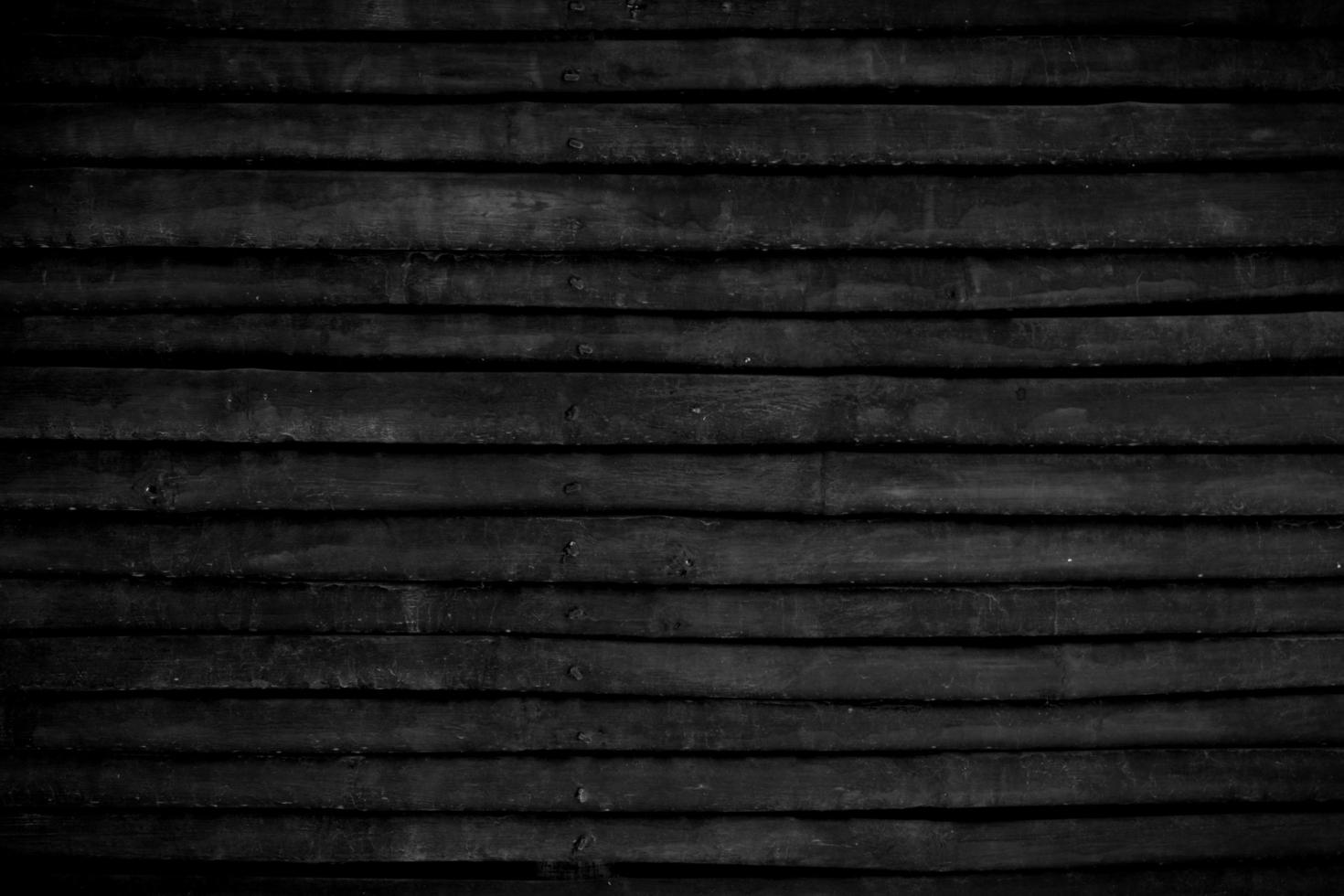 bambu de madeira preta horizontal para textura de fundo. foto