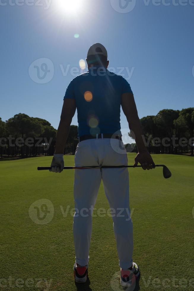 retrato de jogador de golfe de costas foto