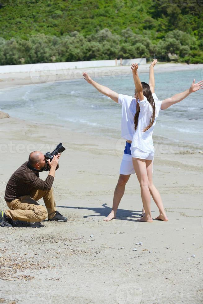 fotógrafo tirando foto na praia