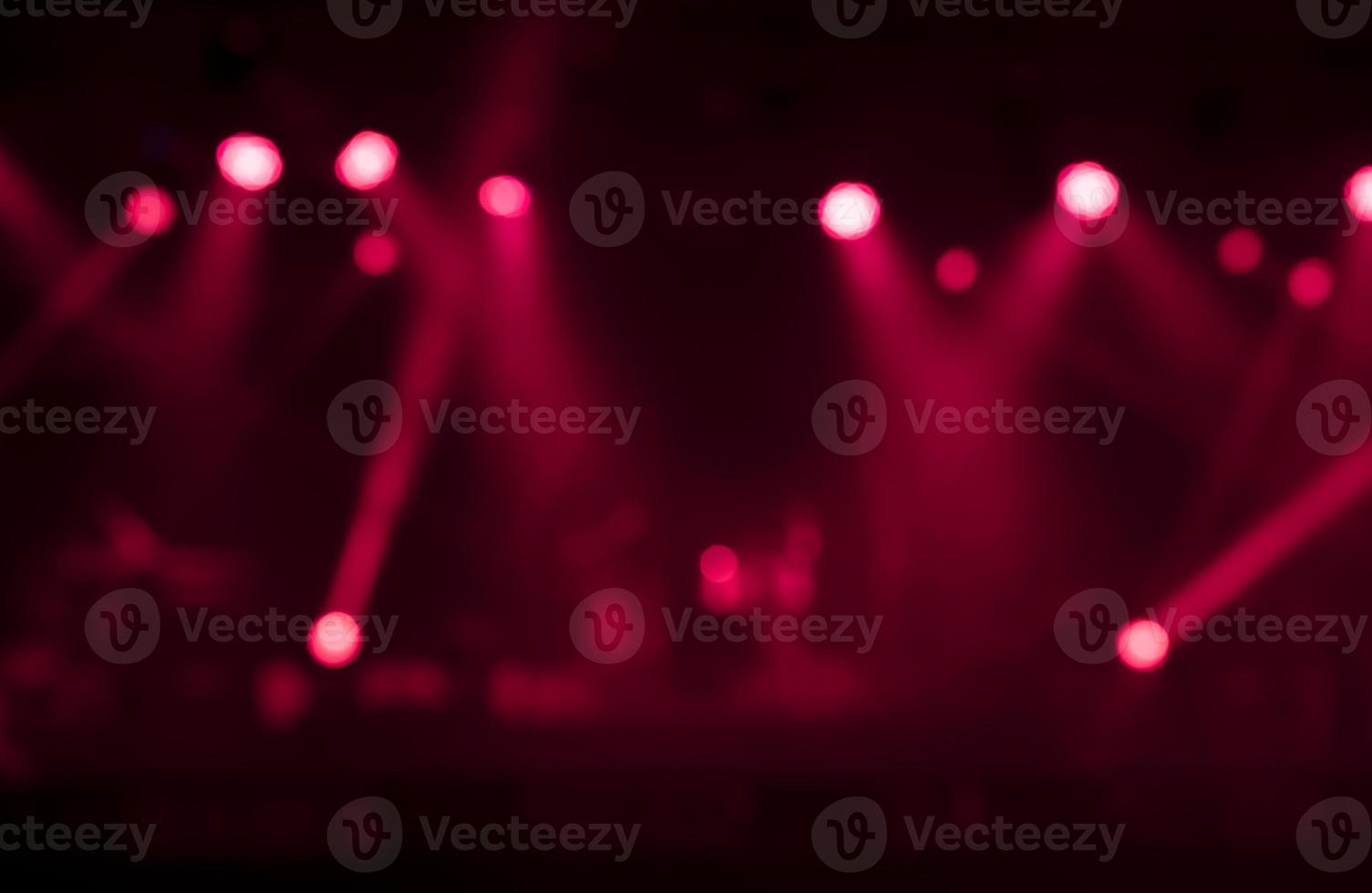 desfocar a imagem do fundo das luzes do palco vermelho foto