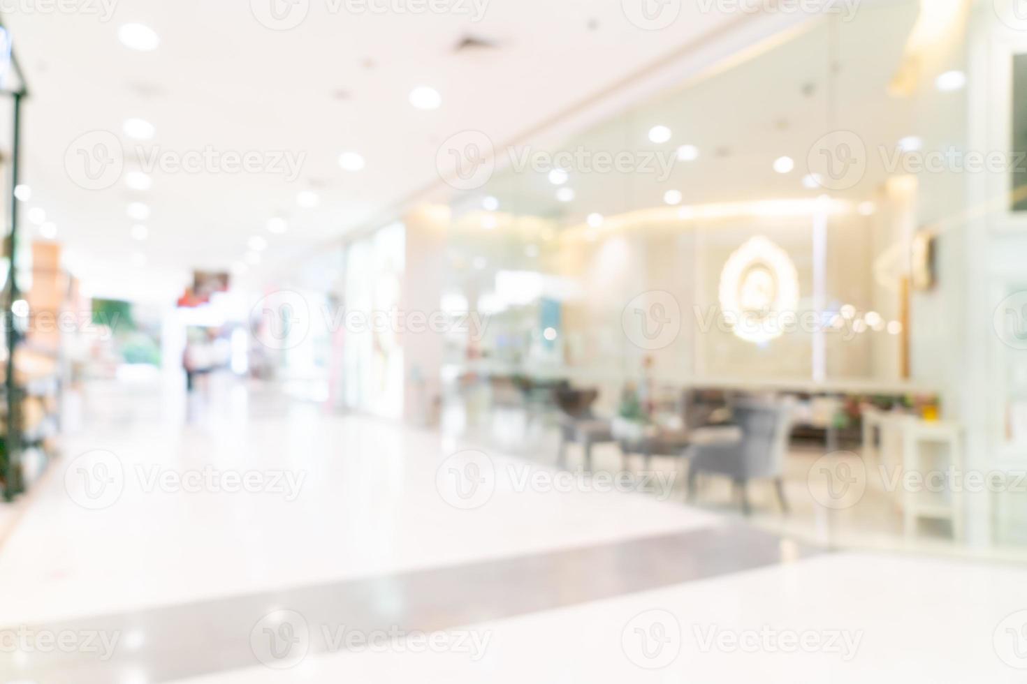 loja de borrão abstrata e loja de varejo em shopping center foto