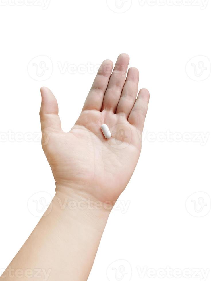 homem segurando remédio em uma mão sobre saúde e conceito médico isolado no branco foto