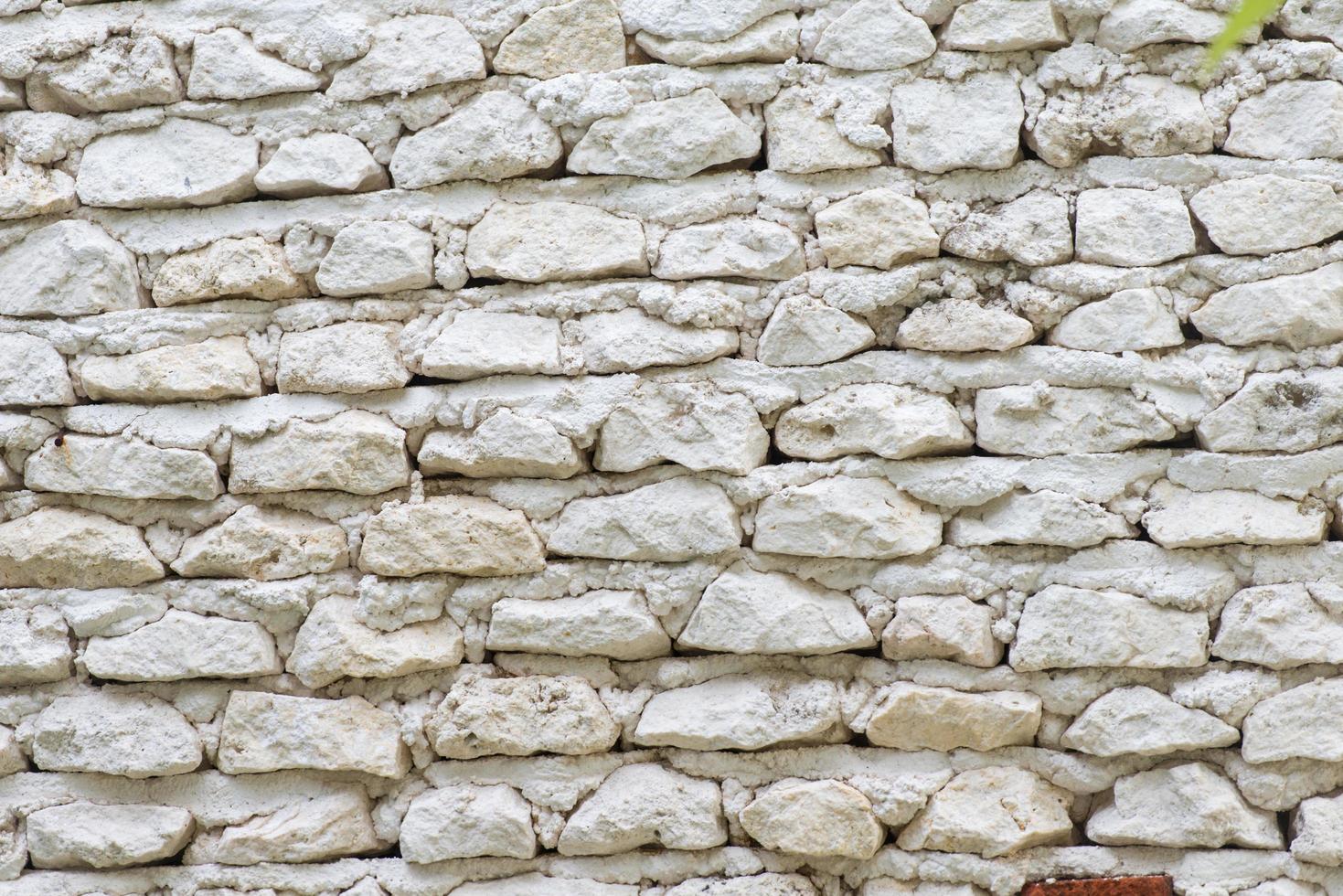 fundo de parede de pedra branca foto