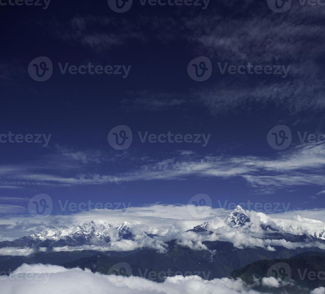 o motor de asa-delta no céu - nepal foto